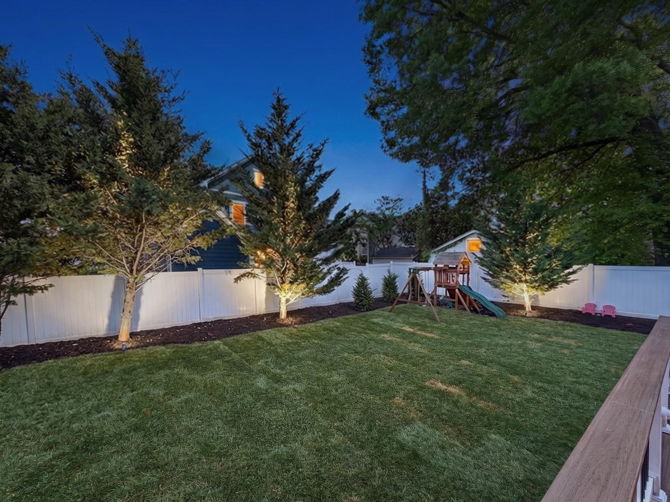 909 19th St S — backyard at twilight